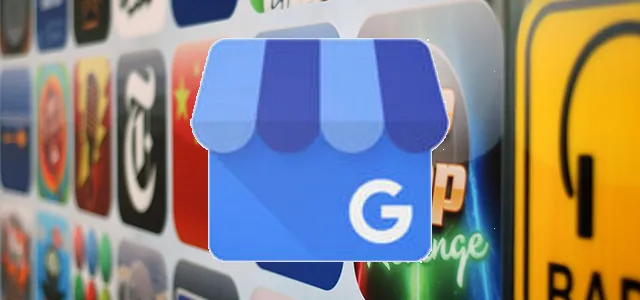 Hands holding a phone with a map app while setting up a Google Business Profile